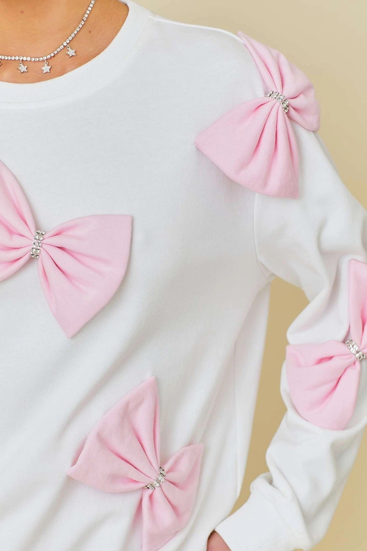 Blushing in Bows Pullover