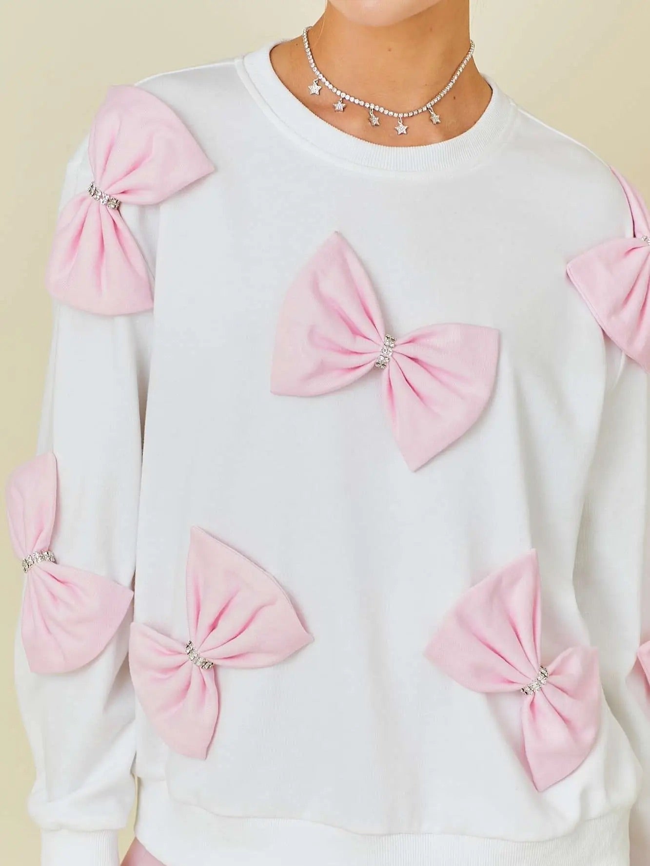 Blushing in Bows Pullover