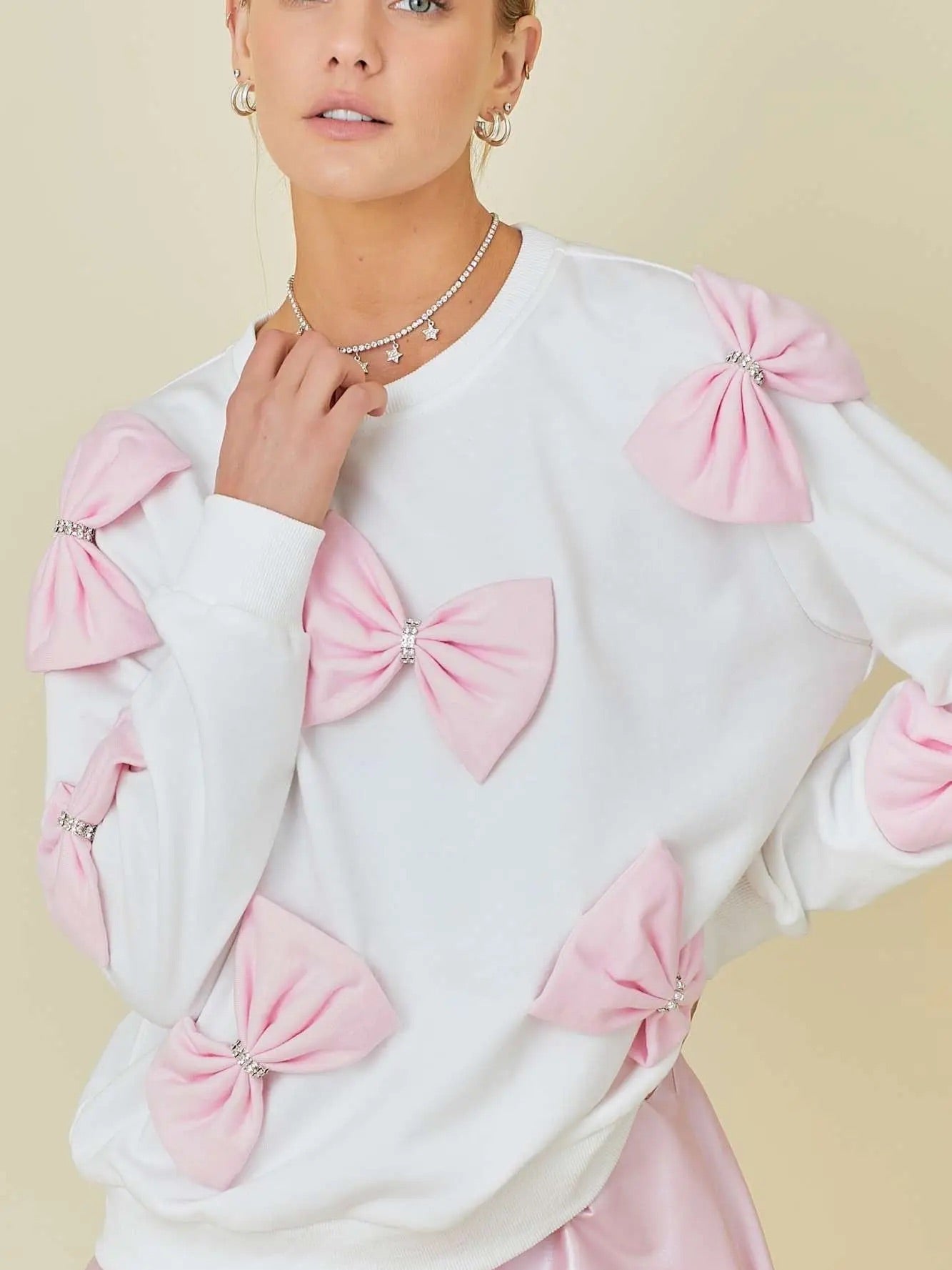 Blushing in Bows Pullover